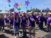 Penny Baggett, center, will walk in Vancouver’s first ever Walk to End Alzheimer’s at Esther Short Park in honor of her late father Don, who had Lewy Body Dementia. Baggett has previously participated twice in Portland’s walks, and finds that they provide a sense of community.