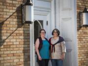 Ficstitches Yarns kit club founders Carissa Jane Reid, left, and Laurinda Reddig stand outside the Camas Public Library.