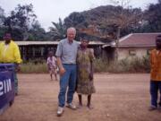 WSU Vancouver anthropology professor Barry Hewlett, left, poses with an Ebola survivor in the Republic of Congo.