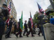 Members of the Vancouver Police Department and Vancouver Fire Department honor guard post the colors outside City Hall at the start of the annual Sept. 11 remembrance Tuesday morning, Sept. 11, 2018.