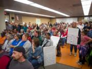 Teachers and community members fill the Battle Ground Public Schools board room during a special meeting Wednesday at the Lewisville Campus. The board voted to authorize an injunction against the district’s teachers, potentially forcing them to either return to the classroom or strike in contempt of court.