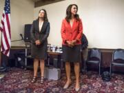 Candidate Carolyn Long, left, and Incumbent U.S. Rep. Jaime Herrera Beutler, R-Battle Ground, wait for the beginning of the 3rd Congressional Candidate Forum hosted by the Woodland Chamber of Commerce at the Oaktree Restaurant in Woodland on Tuesday afternoon, Sept. 18, 2018.