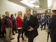 Mark Ross, superintendent of the Battle Ground Public Schools, center, walks past striking teachers after Judge Scott Collier ruled the strike was unlawful at the Clark County Courthouse on Friday morning, Sept. 14, 2018.