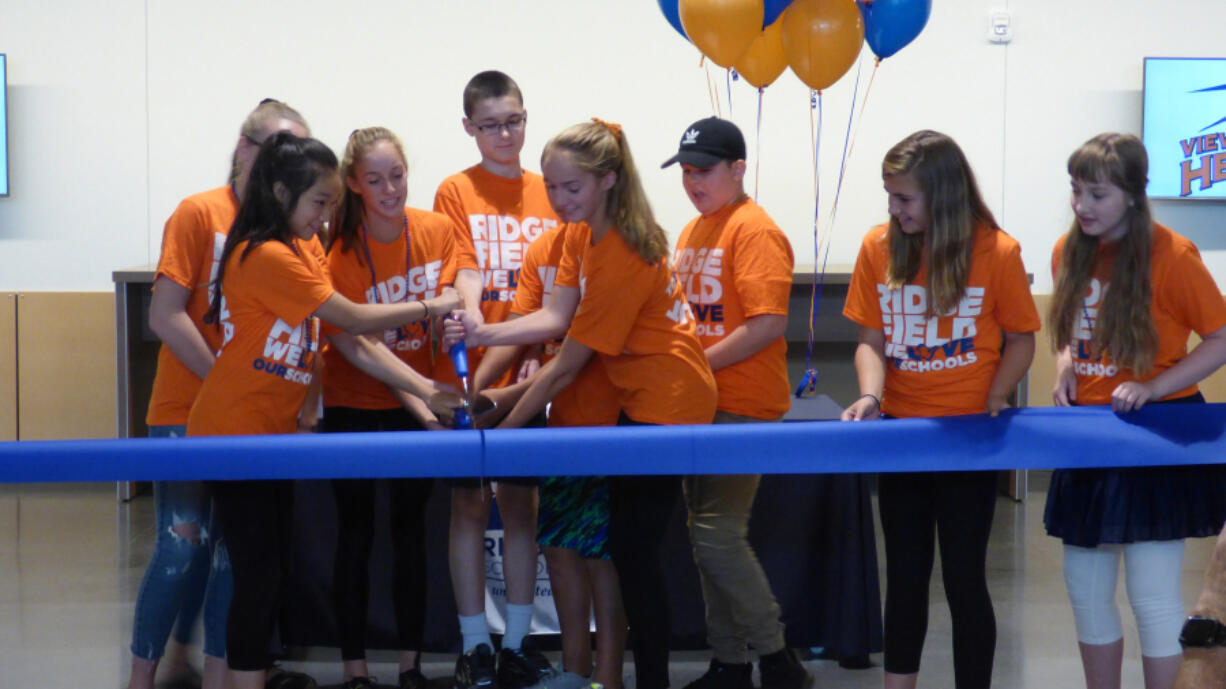 Ridgefield: View Ridge Middle School students participate in a ribbon-cutting ceremony for Ridgefield School District’s new grades five through eight campus, the new Sunset Ridge Intermediate School.