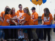 Ridgefield: View Ridge Middle School students participate in a ribbon-cutting ceremony for Ridgefield School District’s new grades five through eight campus, the new Sunset Ridge Intermediate School.