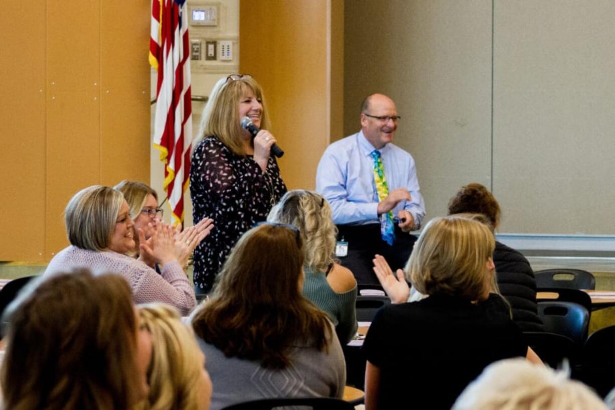 Woodland: New Woodland Intermediate School Principal Denise Pearl introduces new teachers on Sept. 10 at the district’s all-staff breakfast, where Superintendent Michael Green, right, discussed attendance and graduation goals for the future.