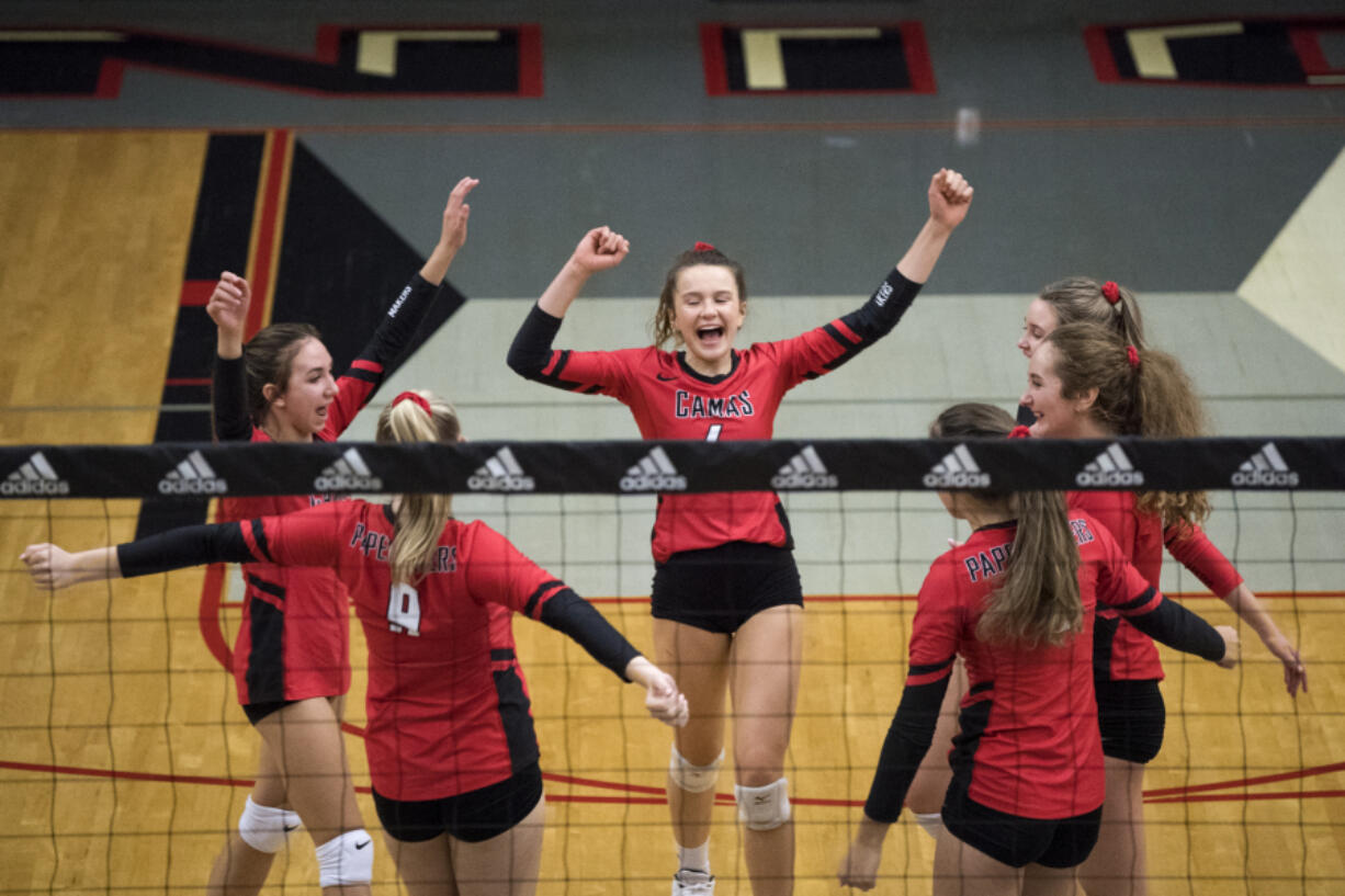 Camas celebrates a point during the game at Union High School in Camas on Thursday, Sept. 20, 2018.