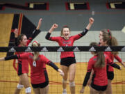 Camas celebrates a point during the game at Union High School in Camas on Thursday, Sept. 20, 2018.