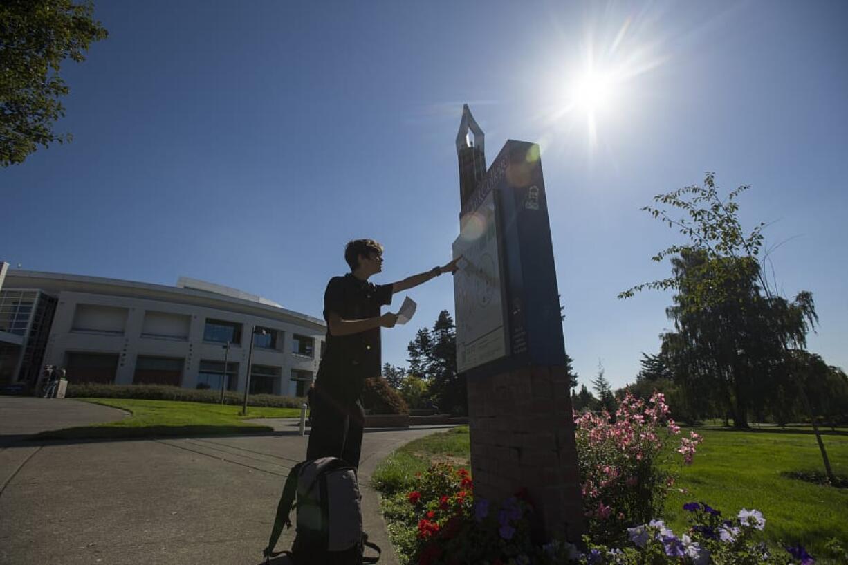 Second-year student Gage Beck of Vancouver gets a little help finding his way around campus during the first day of fall quarter at Clark College on Monday morning.