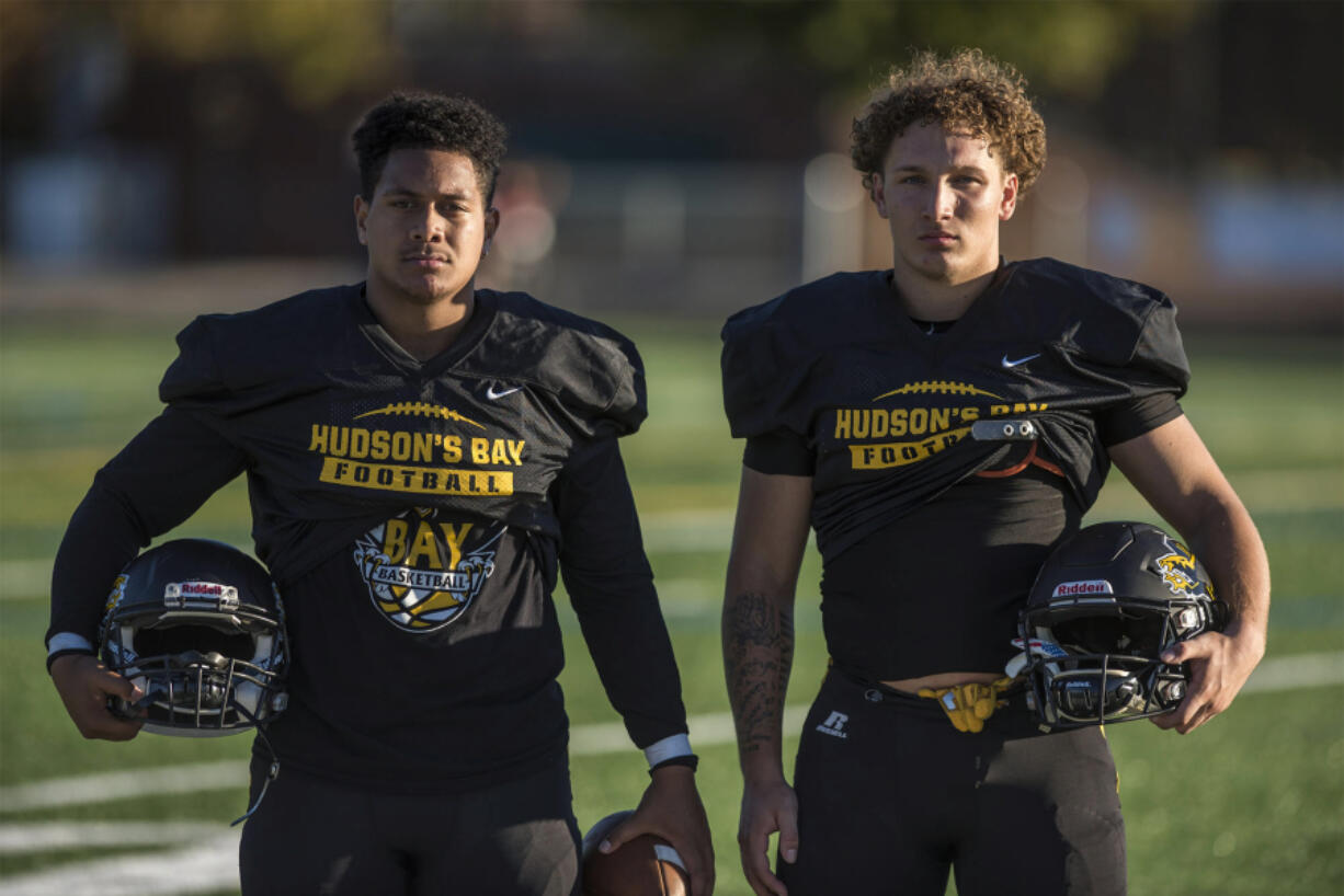 Hudson's Bay Seniors Toa Kaumatule, left, and Carter Morse first met on the football field in middle school. The two now share a bond for the Hudson's Bay Eagles.