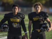 Hudson's Bay Seniors Toa Kaumatule, left, and Carter Morse first met on the football field in middle school. The two now share a bond for the Hudson's Bay Eagles.