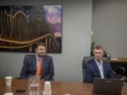 State Rep. Brandon Vick, R-Felida, left, and Democratic challenger Chris Thobaben speak with members of The Columbian’s Editorial Board on Tuesday.