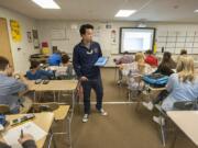 View Ridge Middle School math teacher Nam Nguyen works with eighth-grade students at View Ridge Middle School.