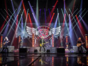 The Columbian files REO Speedwagon on tour.