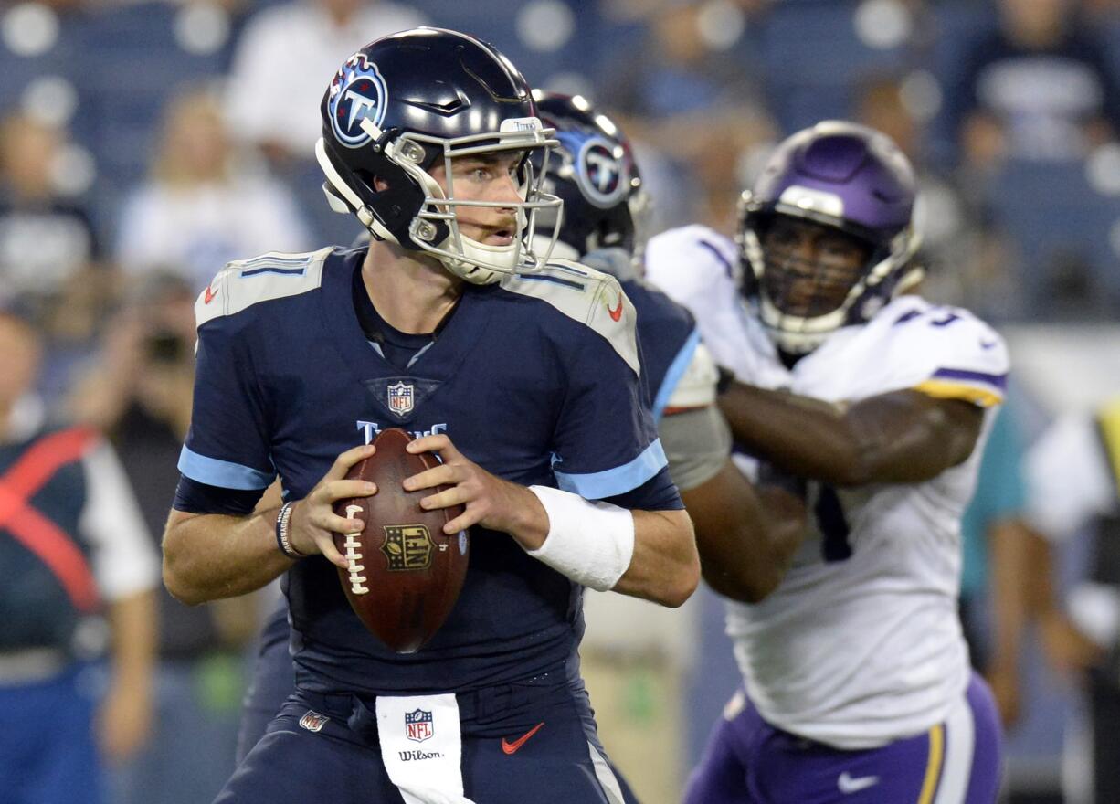 Tennessee Titans quarterback Luke Falk (11) plays against the Minnesota Vikings in the first half of a preseason NFL football game Thursday, Aug. 30, 2018, in Nashville, Tenn.