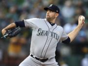 Seattle Mariners pitcher James Paxton works against the Oakland Athletics during the first inning of a baseball game Saturday, Sept. 1, 2018, in Oakland, Calif.