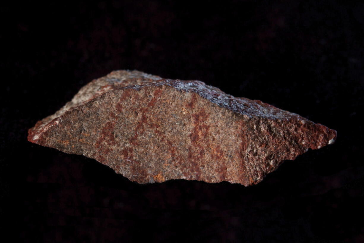 A drawing made with ochre pigment on silcrete stone, was found in the Blombos Cave east of Cape Town, South Africa. In a report released Sept. 12, scientists say this tiny 73,000-year-old sketch found in a South African cave is the oldest known drawing.