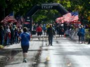 Runners are spread thin as they reach the finish line of the inaugural Apple Tree Marathon in Vancouver on Sunday, September 16, 2018.