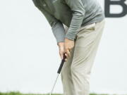 Keegan Bradley putts for the win in the playoff hole during the BMW Championship golf tournament at the Aronimink Golf Club, Monday, Sept. 10, 2018, in Newtown Square, Pa. Bradley held off Justin Rose in a sudden-death playoff to win the rain-plagued BMW Championship for his first PGA Tour victory in six years.