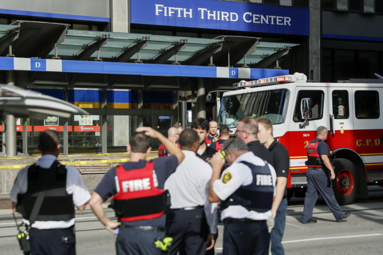 Emergency personnel and police respond to reports of an active shooter situation near Fountain Square, Thursday, Sept. 6, 2018, in downtown Cincinnati.