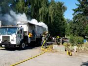 Collected materials ignited and burned a Waste Connections recycling truck Wednesday afternoon in an area north of Vancouver.