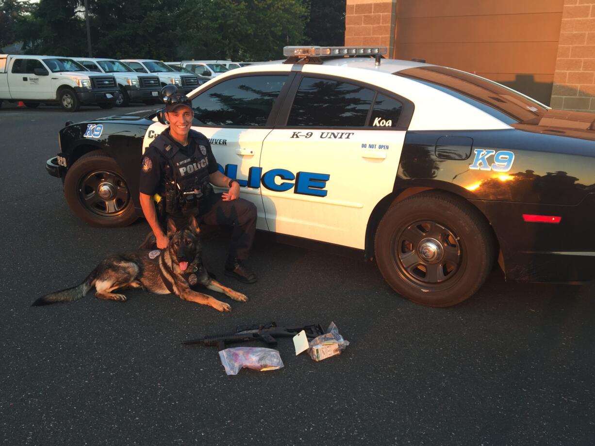 Vancouver police canine Koa and officer R. Epperson -- who completed K-9 training on Tuesday -- were on their first deployment Wednesday when they located two lbs. of heroin, a rifle and hundreds of round of ammunition believed to be tied to heroin distribution case.