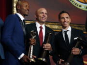 Ray Allen, Jason Kidd and Steve Nash, from left, pose for a photo after induction ceremonies at the Basketball Hall of Fame, Friday, Sept. 7, 2018, in Springfield, Mass.