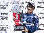 Takuma Sato celebrates his first-place finish at an IndyCar auto race, Sunday, Sept. 2, 2018, in Portland, Ore.