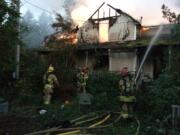 Clark County firefighters responded to a fire Monday morning at what is believed to be an abandoned house east of La Center.