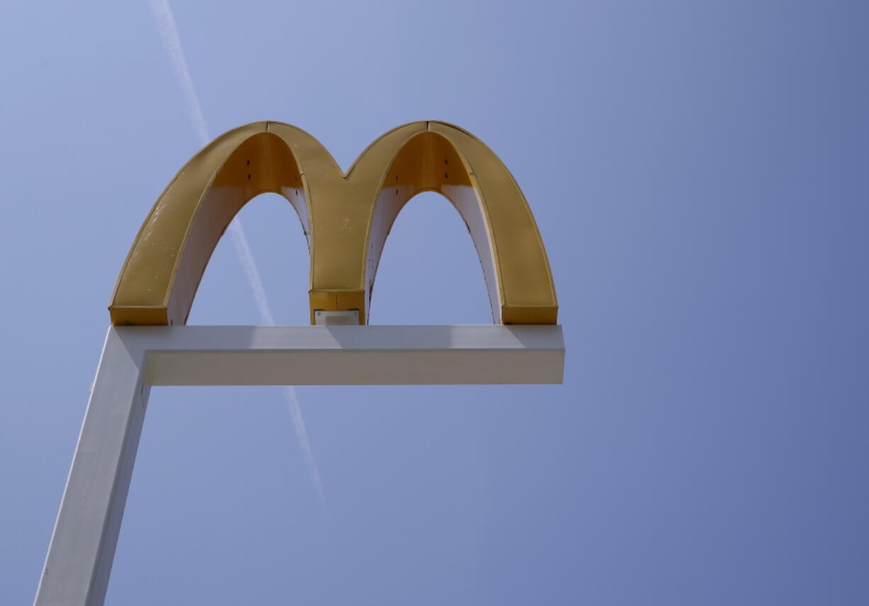 The logo of McDonald’s at flagship restaurant in Chicago. McDonald’s workers are going on strike next week. Emboldened by the #MeToo movement, McDonald’s workers have voted to stage a one-day strike next week at restaurants in 10 cities. Plans are for the walkout to start lunchtime on Sept. 18. (AP Photo/Nam Y.