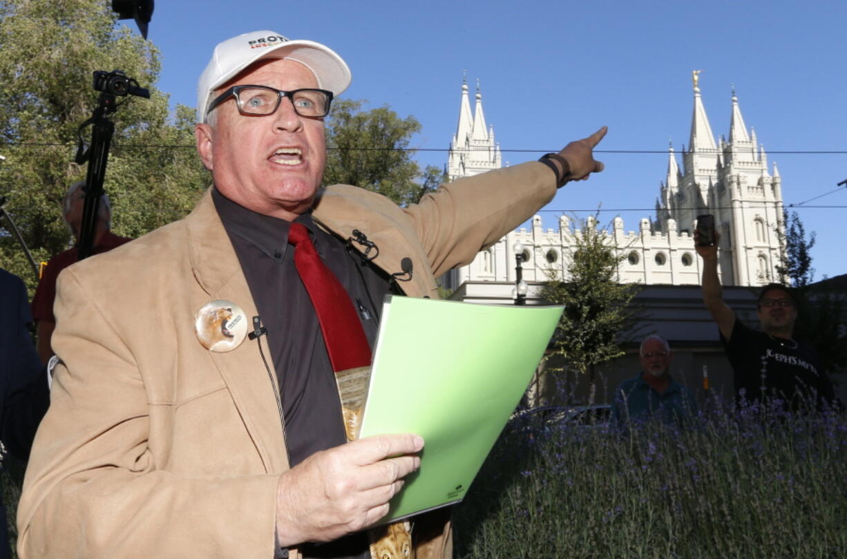 Sam Young speaks during a press conference Sunday, Sept. 16, 2018, in Salt Lake City. Young, a Mormon man who led a campaign criticizing the church’s practice of allowing closed-door, one-on-one interviews of youth by lay leaders has been kicked out of the faith. Young read a verdict letter for the first time Sunday that had been delivered to him following an earlier disciplinary hearing with local church leaders in Houston. Young, a 65-year-old lifelong Mormon, becomes the third high-profile member of the faith who led protests about church policy to be excommunicated in recent years.