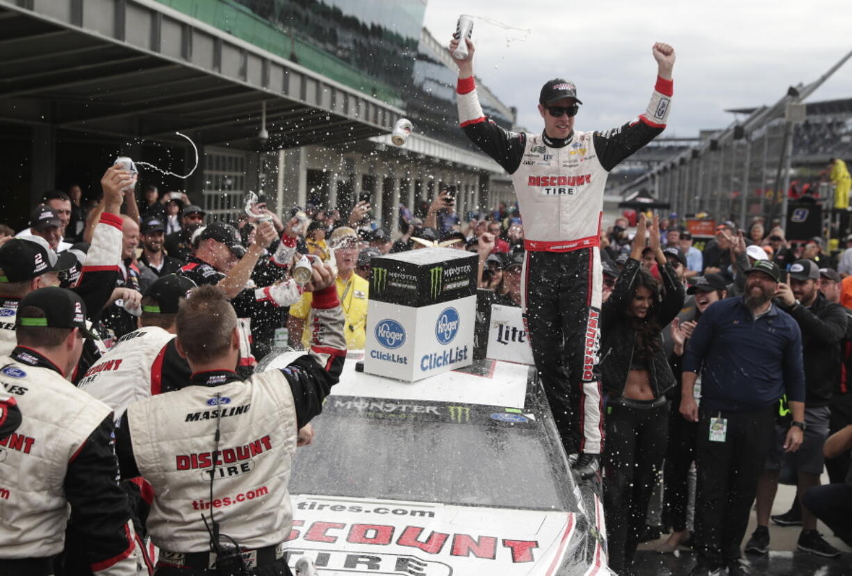 NASCAR Cup Series driver Brad Keselowski (2) celebrates after winning the NASCAR Brickyard 400 auto race at Indianapolis Motor Speedway, in Indianapolis Monday, Sept. 10, 2018.