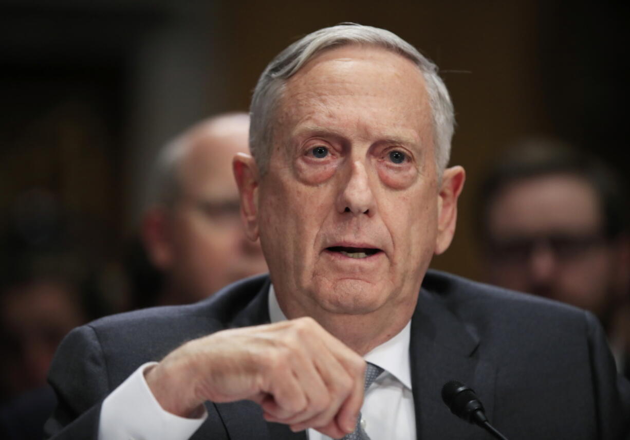 Secretary of Defense Jim Mattis testifies in Washington. U.S. officials say stricter immigration policies have stymied Pentagon plans to restart a program allowing thousands of people with medical or Asian and African language skills to join the military and become American citizens.