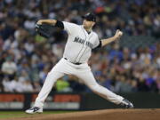 Seattle Mariners starting pitcher James Paxton works against the Texas Rangers during the first inning of a baseball game, Saturday, Sept. 29, 2018, in Seattle.