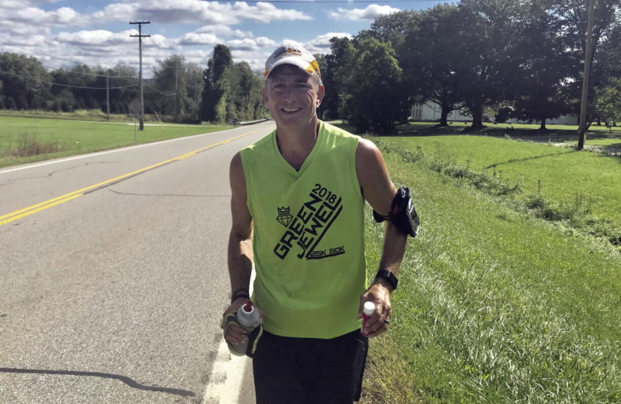 John Kennedy is shown on the road from Utica, Ohio, to Johnston, Ohio. The 52-year-old diabetic set out Friday for a two-day, 142-mile run to draw attention to the rising costs of insulin and other prescription drugs.