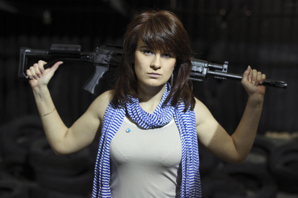 Maria Butina, a gun-rights activist, poses for a photo at a shooting range in Moscow, Russia. When gun activist Maria Butina arrived in Washington in 2014 to network with the NRA, she was peddling a Russian gun rights movement that was already dead. Fellow gun enthusiasts and arms industry officials describe the strange trajectory of her Russian gun lobby project, which U.S. prosecutors say was a cover for a Russian influence campaign. Accused of working as a foreign agent, Butina faces a hearing Monday, Sept. 10 in Washington.