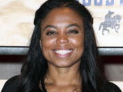 FILE - In this is a Feb. 3, 2017, file photo Jemele Hill attends ESPN: The Party 2017 in Houston, Texas. The outspoken ESPN personality has announced she is leaving the company. Hill attracted attention last year and was briefly suspended for opinionated messages on social media, including a reference to President Donald Trump as a “white supremacist.” She tweeted Friday, Sept. 14, 2018, that it was her last day at ESPN.