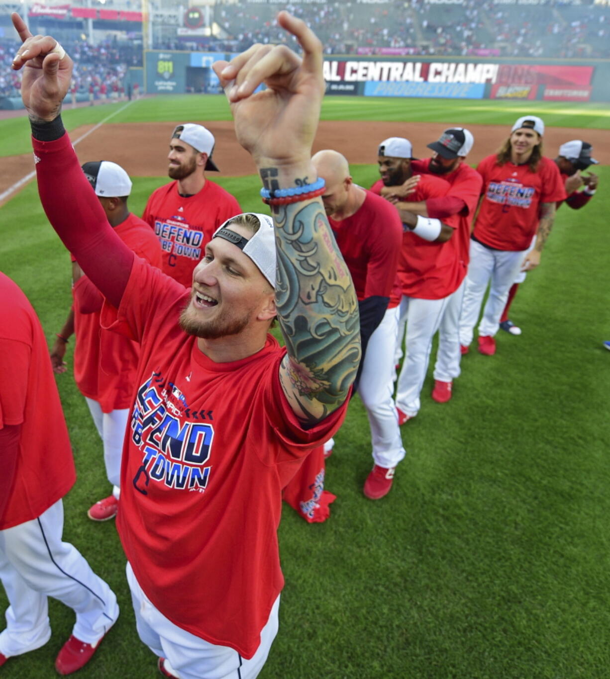 Cleveland Indians’ Brandon Barnes celebrates after the Indians defeated the Detroit Tigers 15-0 to clinch the American League Central Division, in a baseball game, Saturday, Sept. 15, 2018, in Cleveland.