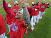 Cleveland Indians’ Brandon Barnes celebrates after the Indians defeated the Detroit Tigers 15-0 to clinch the American League Central Division, in a baseball game, Saturday, Sept. 15, 2018, in Cleveland.