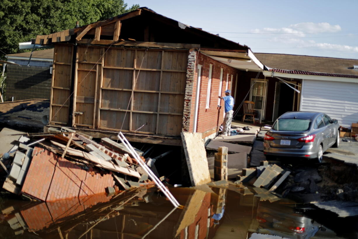 Part of the Starlite Motel is washed away in the aftermath of flooding from Hurricane Florence in Spring Lake, N.C., on Wednesday.