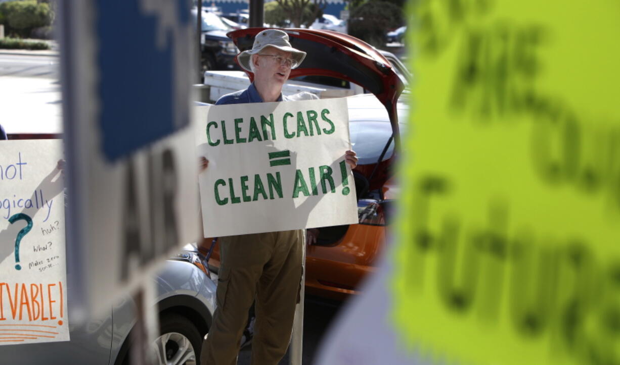 Paul Gipe protests Monday in Fresno, Calif., before the first of three public hearings on the Trump administration’s proposal to roll back car-mileage standards.