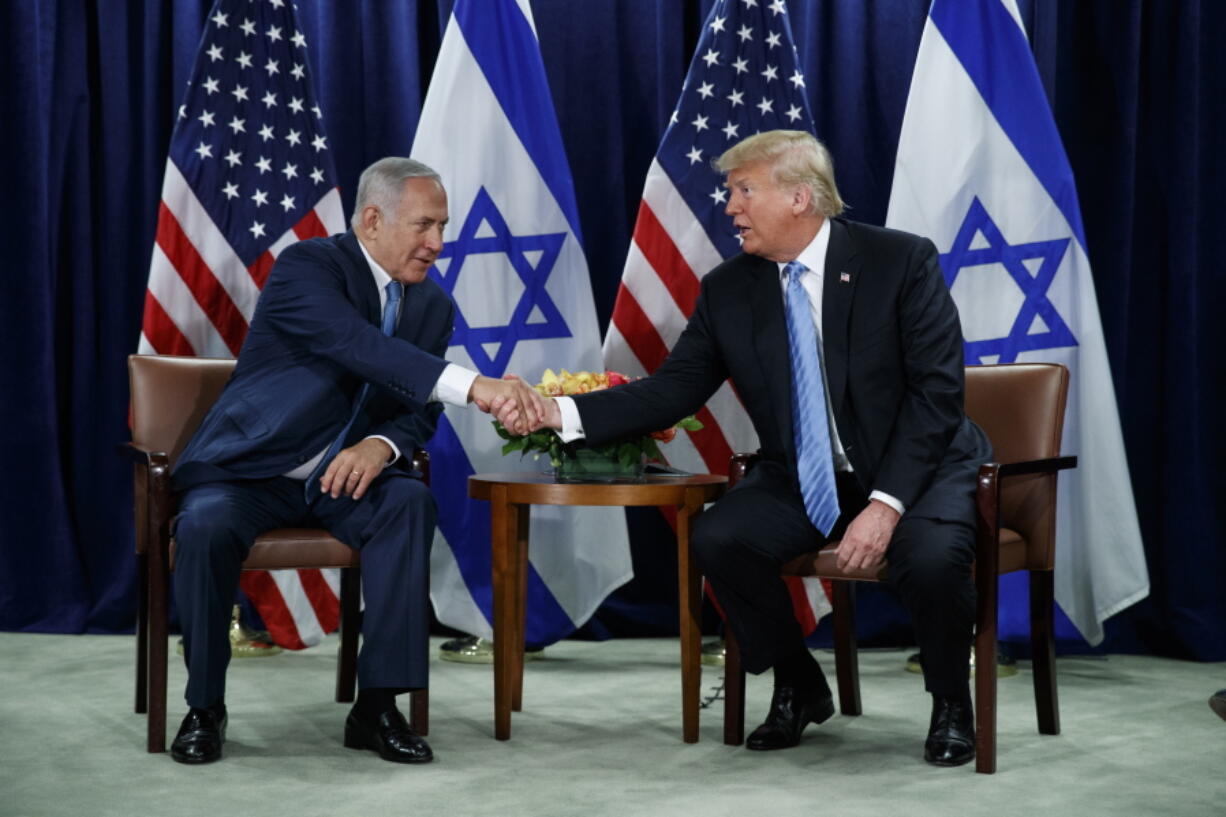 President Donald Trump shakes hands with Israeli Prime Minister Benjamin Netanyahu at the United Nations General Assembly on Wednesday at U.N. Headquarters.