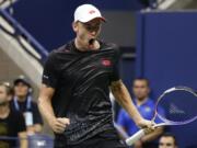 John Millman, of Australia, reacts after winning a point against Roger Federer, of Switzerland, during the fourth round of the U.S. Open tennis tournament, Monday, Sept. 3, 2018, in New York.