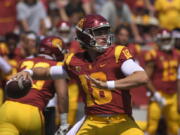 FILE - In this Sept. 1, 2018, file photo, Southern California quarterback J.T. Daniels passes during the first half of an NCAA college football game against UNLV in Los Angeles. The Trojans will attempt to avoid their first three-game losing streak in a single season since 2012 when they host unbeaten Washington State at the Coliseum in their first Friday night home game since 1999. (AP Photo/Mark J.