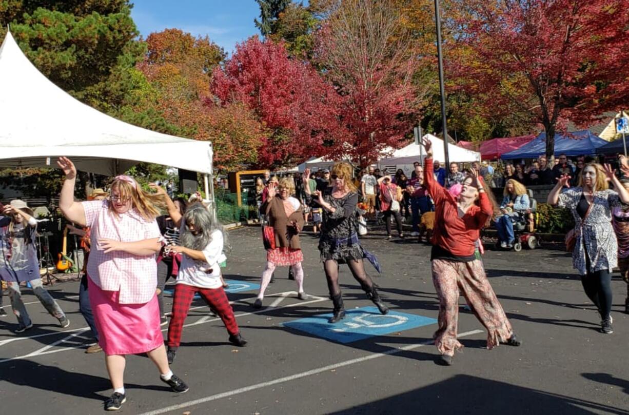 A flash mob of dancers performs the “Thriller” dance during the Vancouver Farmers Market on Saturday afternoon. The performance was organized by local Zumba instructors.