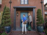 Environmentalists Alona and Don Steinke canvass the Carter Park neighborhood to inform voters of Initiative 1631, a ballot measure that would price carbon. The Steinkes have become prominent activists in the region’s environmental community.