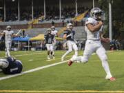 Union's Joseph Siofele runs past Skyview defenders to score a touchdown the Kiggins Bowl on Friday night, Oct.