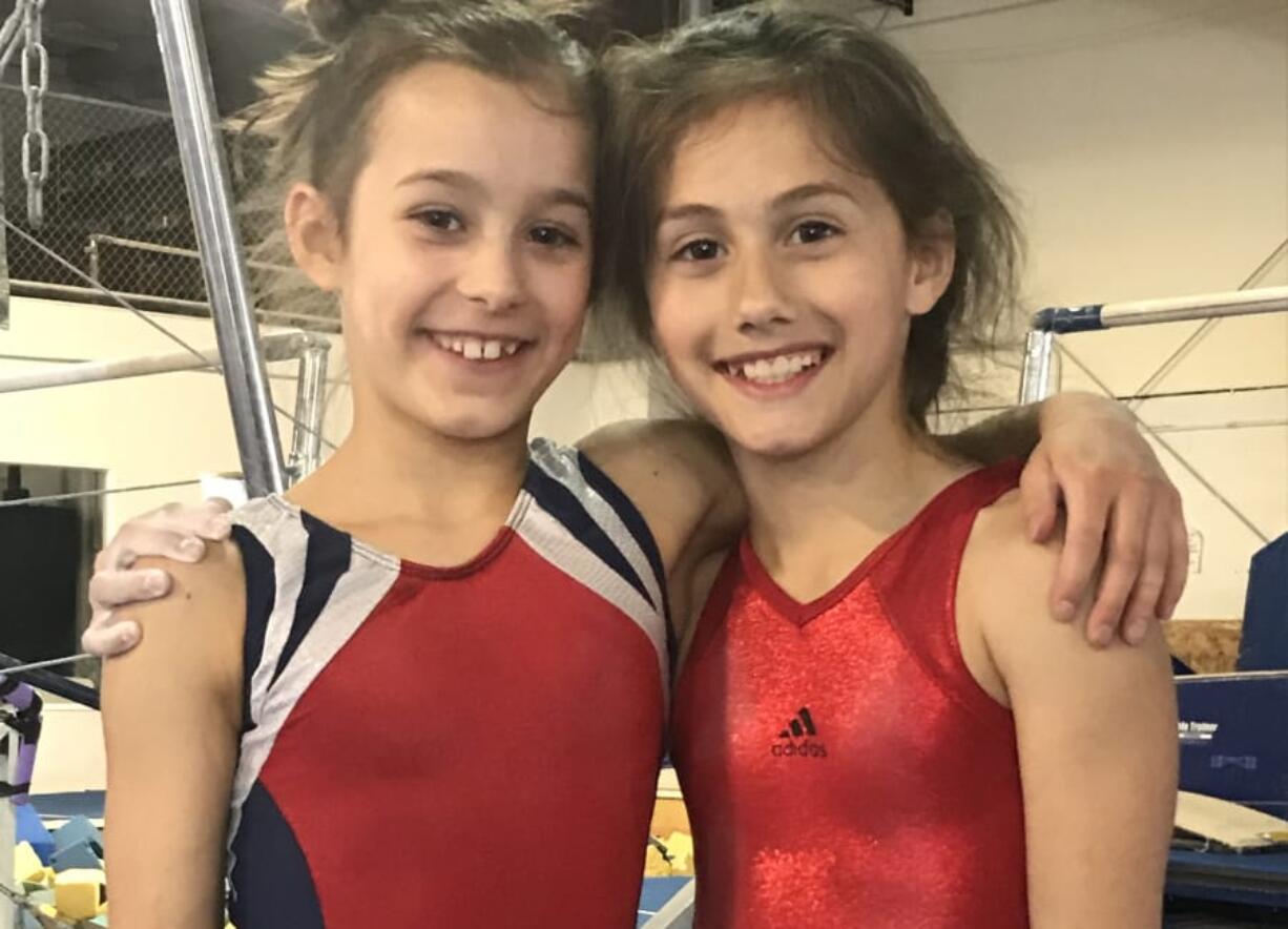 Local gymnasts Athena Lee, left, and Hadley Palmerton were selected to compete in Indianapolis this month in the USA Gymnastics Talent Opportunity Program, which seeks to identify youths with the potential to become elite gymnasts.