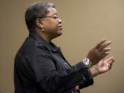 Composer Judy Rose, a Clark County resident, listens to the Portland Symphonic Choir rehearse her new spiritual, “I’ve Found Me a River,” on Tuesday night at the Rose City Park Presbyterian Church in Portland. The piece gets its world premiere during a concert Saturday night at The Tiffany Center.