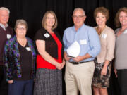 Central Vancouver: Innovative Services NW board members, from left, Dick James, Mary Dunford, Amy Shannon, Rob Woodward, Bobbi Heitschmidt and Darcey Reed accept The Governance Award at the Nonprofit Excellence Awards on Sept. 13.